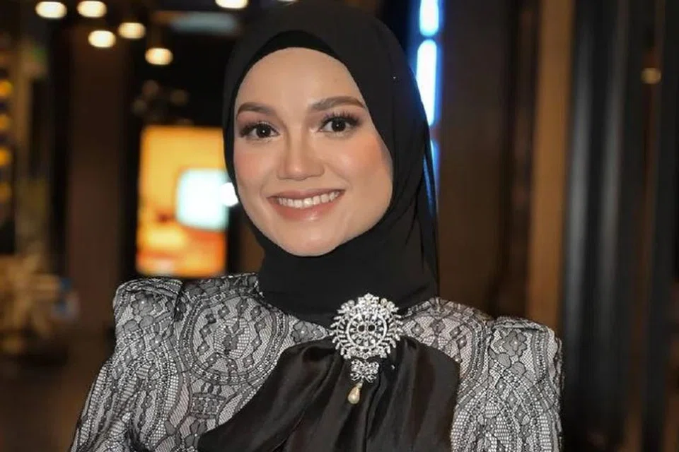 Puteri Sarah Liyana semasa majlis rumah terbuka Hari Raya Aidilfitri yang dianjurkannya  di sebuah hotel terkemuka di ibu kota pada Sabtu.