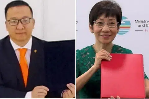 KOMITMEN TERHADAP IKLIM: Menteri Kemampanan dan Sekitaran, Cik Grace Fu (kanan), dan Menteri Sekitaran dan Pelancongan Mongolia, Encik Bat-Erdene Bat Ulzii, telah menandatangani satu MOU baru bagi membolehkan kededua negara mengenal pasti projek yang dapat membantu mencapai matlamat menangani perubahan iklim. 