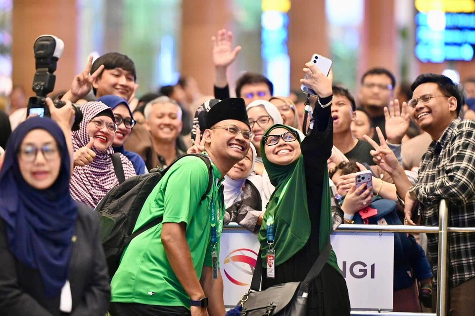 Jemaah haji Singapura di Terminal 3 Lapangan Terbang Changi pada 13 Mei.