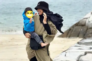 Mizz Nina atau nama sebenarnya Shazrina Azman, 44 tahun bersama anak angkatnya, Musa.