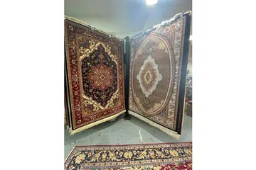 KELEBIHAN PADA SYARIKAT: Rekaan sistem rak pusing akan membantu Tabriz Carpets Pte Ltd untuk mempercepatkan proses pengeluaran karpet dalam masa yang telah dirancang. - Foto TABRIZ CARPETS