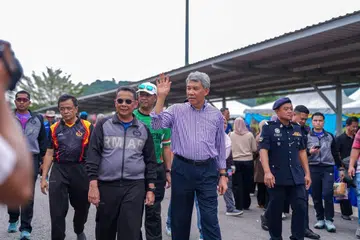 Menteri Luar Malaysia, Datuk Seri Mohamad Hasan (melambai) ketika hadir pada Karnival Hari Keluarga Pangkalan Udara Sendayan 2026 di Negeri Sembilan, pada 19 Julai.