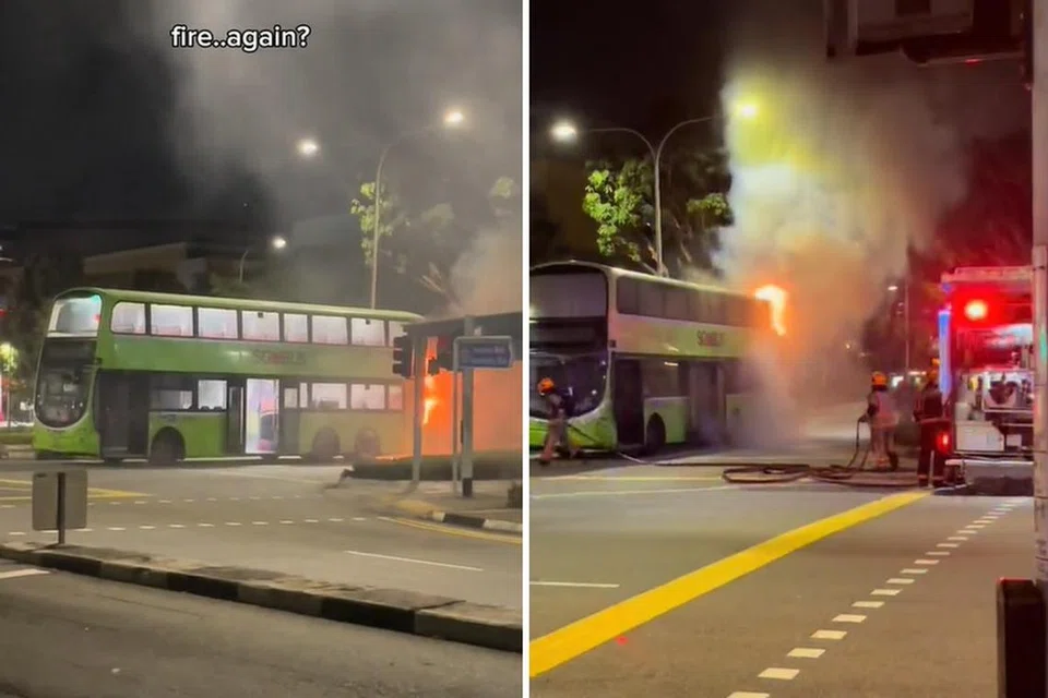 ENJIN TERBAKAR: Sebuah bas dua tingkat kelihatan terbakar, di bahagian enjin, di sebuah simpang Tampines Avenue 4 dan Tampines Avenue 3.