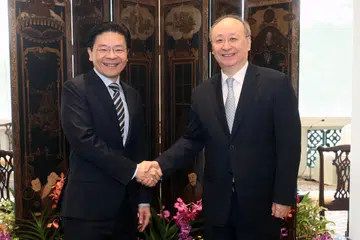 Anggota Biro Politik Parti Komunis China (CPC) yang juga Setiausaha Jawatankuasa CPC Perbandaran Beijing, Encik Yin Li (kanan), semasa kunjungan hormat ke atas Perdana Menteri merangkap Menteri Kewangan, Encik Lawrence Wong, pada 20 Februari.