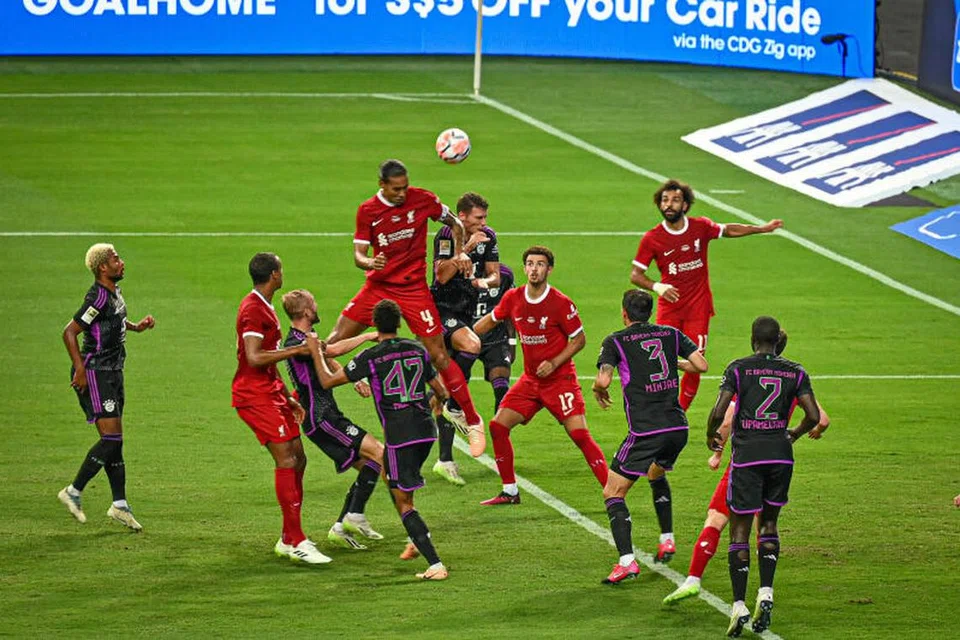 PESTA GOL: Kapten Virgil Van Dijk menjaringkan gol kedua Liverpool ketika menentang Bayern Munich dalam perlawanan persahabatan di Stadium Negara pada Rabu.