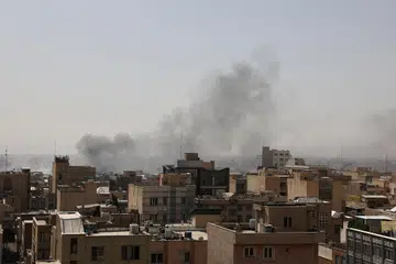 Asap berkepul susulan letupan selepas Israel dan Amerika Syarikat melancarkan serangan ke atas Iran, di Teheran, Iran, 28 Februari 2026