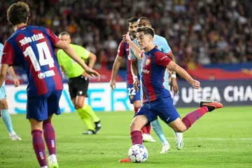 KEMENANGAN BESAR: Pemain tengah Gavi (kanan) dan penyerang Joao Felix (kiri) antara pemain yang menjaringkan gol dalam kemenangan besar Barcelona ke atas Royal Antwerp dalam perlawanan peringkat kumpulan Liga Juara-Juara. 