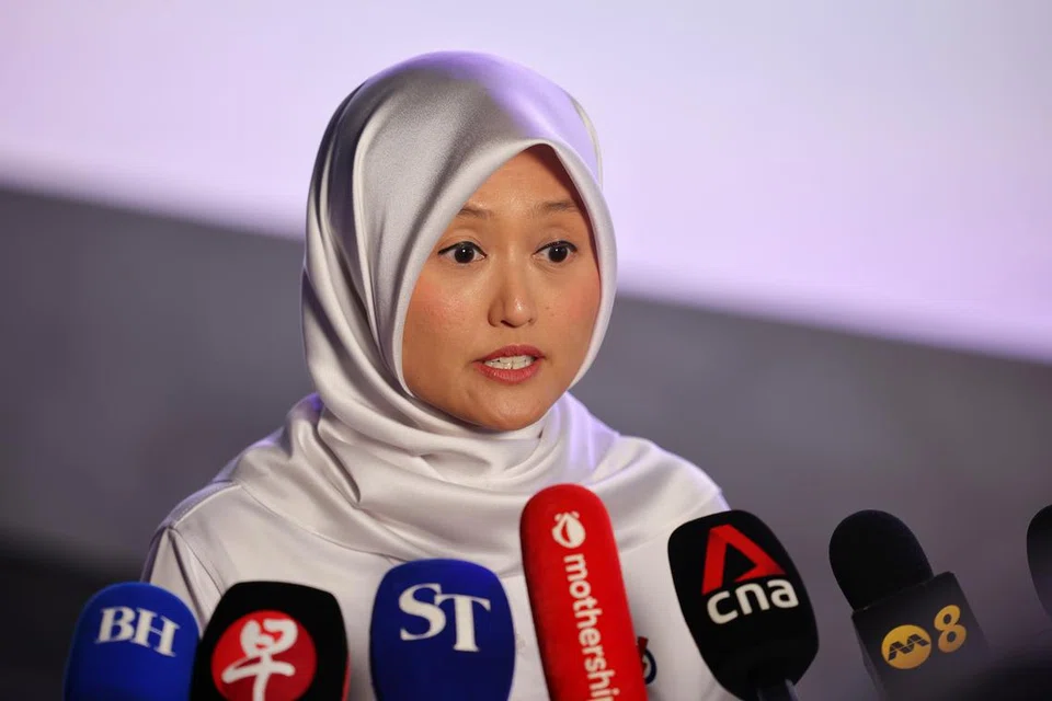 Menteri Negara (Penerangan dan Pembangunan Digital merangkap Kesihatan), Cik Rahayu Mahzam bertemu wartawan setelah pelancaran manifesto Parti Tindakan Rakyat (PAP) di Infinite Studios, daerah one-north pada 17 April.