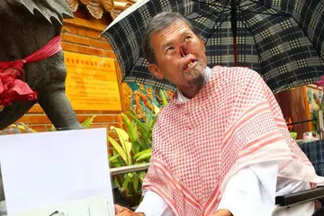 DITANGKAP POLIS: Encik Zeng Guoyuan yang lebih dikenali sebagai 'Parrot Man' dalam satu gambar fail yang diambil pada 2015.
