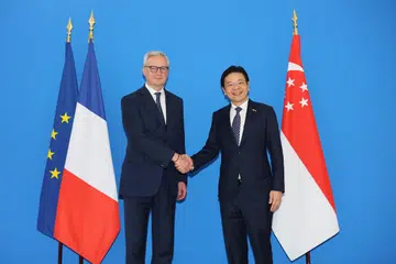 Timbalan Perdana Menteri, Encik Lawrence Wong, (kanan) bertemu Menteri Ekonomi, Kewangan, Perindustrian dan Kedaulatan Digital Perancis, Encik Bruno Le Maire, di Kementerian Kewangan di Paris, Perancis pada 12 April 2024.
