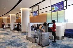 RASMI DIBUKA: Seorang penumpang yang daftar masuk awal di Jewel Changi Airport pada 17 April 2019.