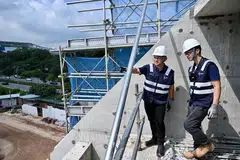 Menteri Negara Kanan (Pertahanan merangkap Tenaga Manusia), Encik Zaqy Mohamad (kiri), melawat tapak binaan Seah Construction di Ang Mo Kio Avenue 5 pada 7 November.