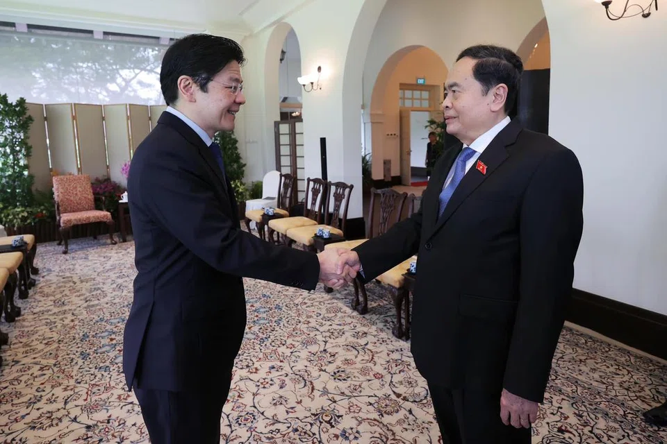 Perdana Menteri Encik Lawrence Wong (kiri) menerima kunjungan Presiden Dewan Negara Vietnam, Encik Tran Thanh Man, pada 2 Disember.