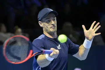 TETAP TEWAS: Meskipun menang set pertama, Andy Murray tetap tewas kepada lawannya Tomas Martin Etcheverry.