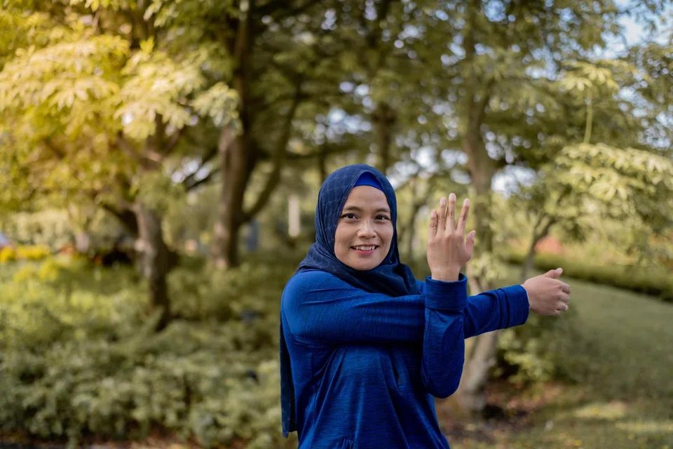 PENTINGKAN KECERGASAN: Cik Aida Raihana kini lebih cergas dan gembira dengan berat badan yang berjaya dikurangkan sebanyak 14 kilogram.