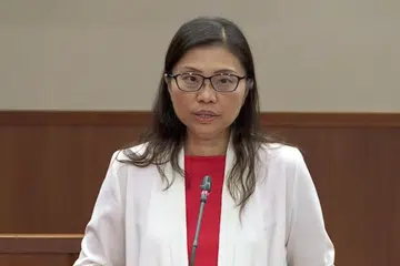 USULAN PENGGANTUNGAN: Cik Poa mengusulkan agar Encik Iswaran digantung dari Parlimen sepanjang tempoh siasatan dijalankan. 