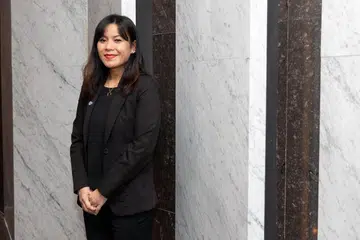 BERMINAT UNTUK BERKHIDMAT: Cik Nur Asyikin Hamzah merupakan salah seorang daripada 6,158 pegawai di Home Team yang dinaikkan pangkat secara rasmi semasa majlis kenaikan pangkat Home Team pada Rabu.