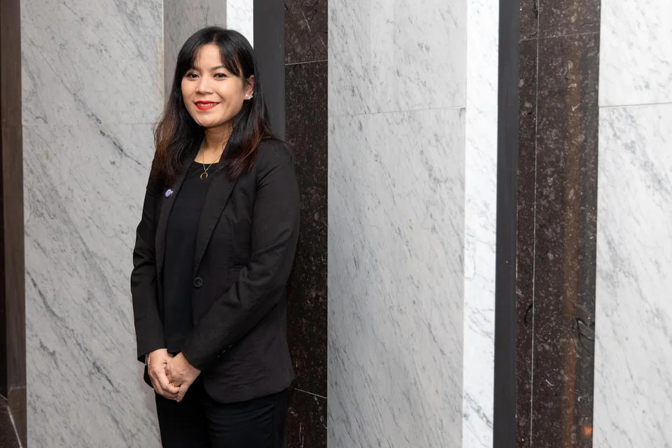 BERMINAT UNTUK BERKHIDMAT: Cik Nur Asyikin Hamzah merupakan salah seorang daripada 6,158 pegawai di Home Team yang dinaikkan pangkat secara rasmi semasa majlis kenaikan pangkat Home Team pada Rabu.
