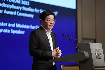 MEMBANGUN BAKAT: Encik Wong sampaikan ucapannya di Hotel Regent Singapore semalam. - Foto MCI