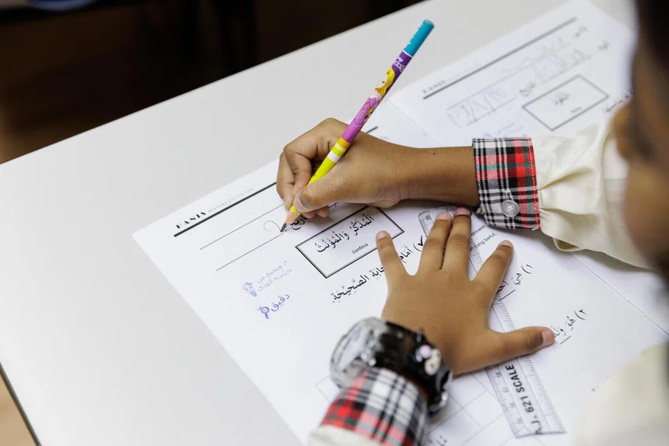 Murid juga belajar menulis dalam bahasa Arab di Hanis Montessori.