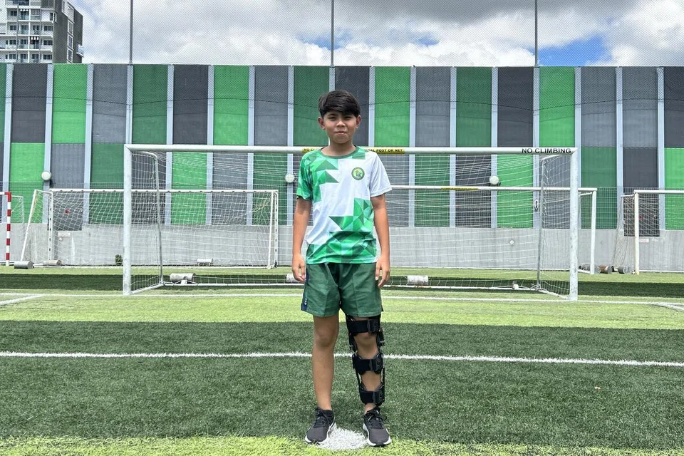 TERIMA BIASISWA: Isyraf Khan Fhirhad, 12 tahun, cemerlang dalam pelajaran dan sukan. 