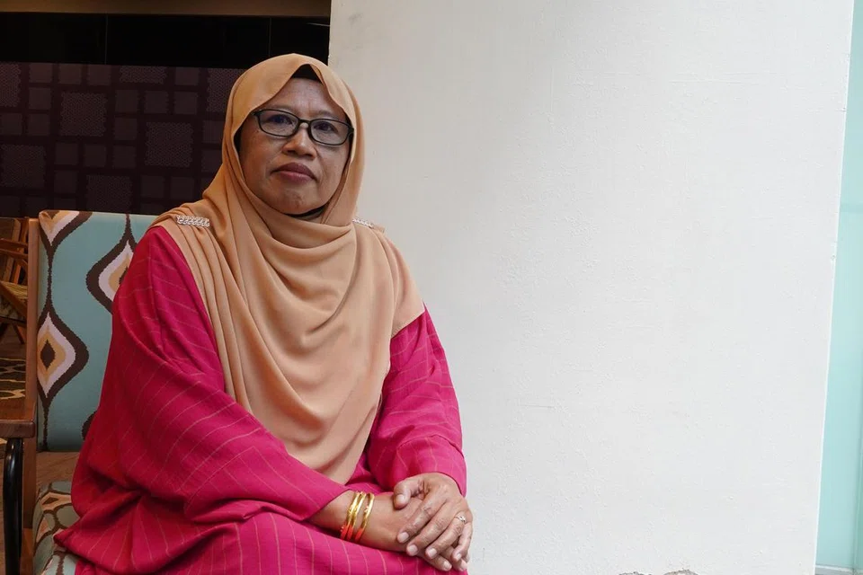 SUKA KANAK-KANAK: Ibu titipan, Cik Waridah Sadauna, telah menjaga tiga anak titipan termasuk seorang anak titipan perempuan berusia lapan tahun.