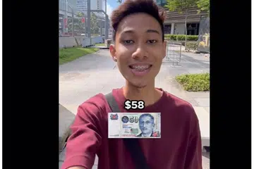 SEBAR KECERIAAN: Encik Muhammad Noor Tijany, yang lebih dikenali sebagai Donjany dalam dunia maya, telah memuat naik video Tik Tok pada Rabu yang menunjukkan beliau membeli dan mengagihkan makanan termasuk biryani dan minuman kepada beberapa pekerja asing.