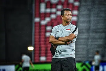 HADAPI SAINGAN SUKAR: Fandi Ahmad dan pasukannya akan berdepan dengan saingan sukar pada Sukan SEA tahun ini apabila Singapura ditempatkan dalam Kumpulan B bersama Thailand, Indonesia, Vietnam, Laos dan Brunei. - Foto BH oleh ARIFFIN JAMAR