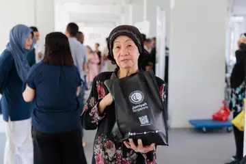 Cik Saamah Ibrahim, 77 tahun, antara sekitar 100 penerima bantuan Jamiyah yang menerima daging korban pada 5 Julai.