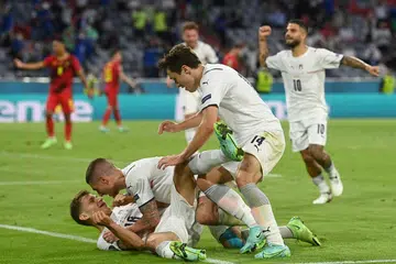 GIRANG: Pemain Italy Nicolo Barella (terbaring) meraikan jaringan gol pertama bersama pasukannya dalam perlawanan menentang Belgium di Munich, Jerman. - Foto REUTERS
