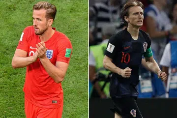 ENGLAND LAWAN CROATIA: Kapten England, Harry Kane (kiri), akan memimpin pasukannya menentang skuad kelas dunia Croatia yang diketuai Luka Modric (kanan) dalam separuh akhir kedua pada pagi Khamis ini. - Foto-foto AFP