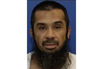 BAKAL DIDAKWA: Riduan Isamuddin, juga dikenali sebagai Hambali, dan dua rakannya akan menghadapi pengadilan rasmi di depan satu suruhanjaya tentera Amerika di Teluk Guantanamo pada 30 Ogos depan. - Foto JABATAN PERTAHANAN AMERIKA