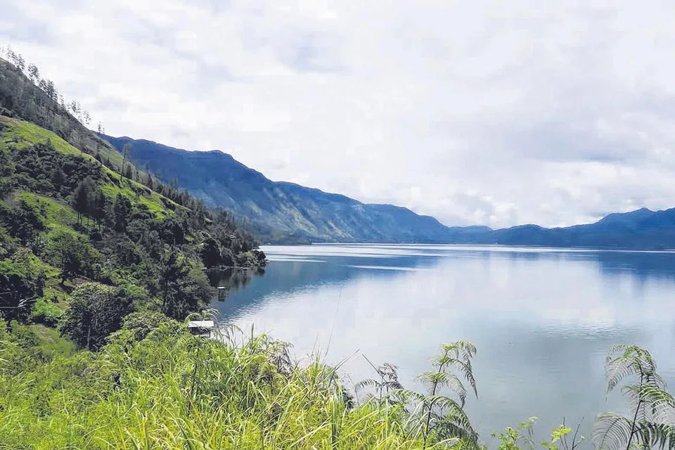 PERSIS EROPAH: Kawasan Danau Laut Tawar di Takengon, Aceh Tengah, terlalu indah pemandangannya. Danau ini menjadi sumber pendapatan dan kehidupan warga Takengon. - Foto NURUL AIN RAZALI