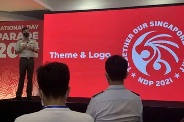 Pengerusi Jawatankuasa Eksekutif NDP 2021, BG Tan Cheng Kwee, mendedahkan tema dan logo NDP tahun ini semasa acara media yang diadakan di Pentas Terapung Marina Bay pada Jumaat, 2 Julai 2021. 