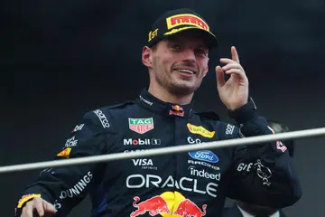 Pemandu Red Bull Racing dari Belanda, Max Verstappen, meraikan kejayaannya di atas podium selepas menjuarai Grand Prix Bahrain di Litar Antarabangsa Sepang pada 4 Oktober.
