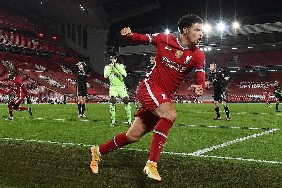 GOL!: Pemain muda Liverpool, Curtis Jones meraikan gol kemenangan pasukannya dalam perlawanan Kumpulan D Liga Juara-Juara menentang Ajax awal pagi semalam. - Foto AFP