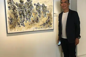 DETIK AWAL PEMBANGUNAN NEGARA: Encik Jeffrey Wandly memaparkan perjalanan seorang remaja dalam mengenali erti pembangunan negara dan tanggungjawab terhadap Singapura dalam lukisan sempena ulang tahun ke-50 Perkhidmatan Negara (NS). - Foto-foto ihsan JEFFREY WANDLY 