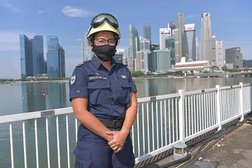 SATU PENGHORMATAN: WO1 Nadya berbesar hati diberi peluang mewakili kontingen SCDF bagi perbarisan istiadat yang akan berlangsung sempena ulang tahun Singapura esok. - Foto JAWATANKUASA EKSEKUTIF NDP 2021