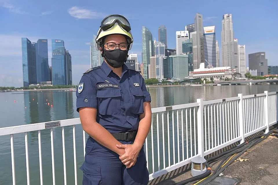 SATU PENGHORMATAN: WO1 Nadya berbesar hati diberi peluang mewakili kontingen SCDF bagi perbarisan istiadat yang akan berlangsung sempena ulang tahun Singapura esok. - Foto JAWATANKUASA EKSEKUTIF NDP 2021