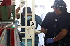 DISAHKAN MATI: Lelaki ditemui di flat Blok 93 Henderson Road bersama mayat isterinya meninggal dunia sehari kemudian. 