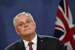 MINTA KONGSI: Perdana Menteri Australia Scott Morrison menekankan bahawa negara yang berjaya membangunkan vaksin Covid-19 harus mengongsinya dengan dunia. - Foto EPA-EFE