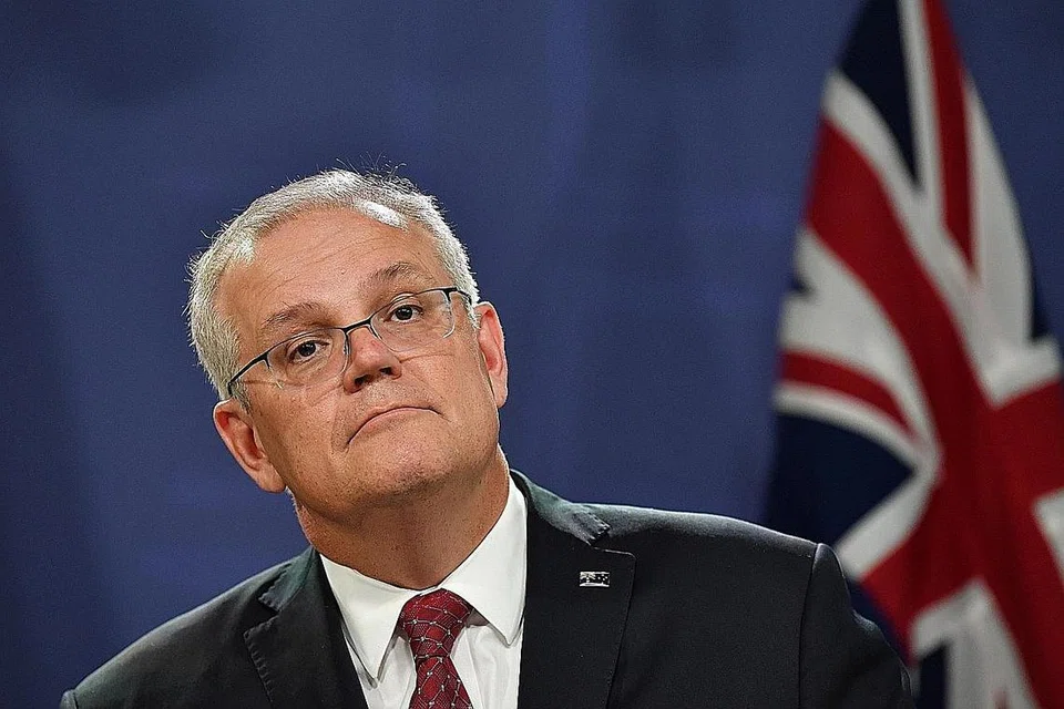 MINTA KONGSI: Perdana Menteri Australia Scott Morrison menekankan bahawa negara yang berjaya membangunkan vaksin Covid-19 harus mengongsinya dengan dunia. - Foto EPA-EFE