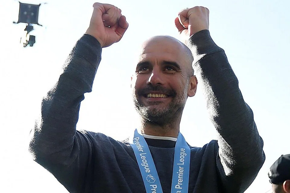 PENCAPAIAN BESAR: Selepas mengharungi musim yang sengit dan sukar, Guardiola dapat menarik nafas lega setelah berjaya membantu City menjadi juara EPL sekali lagi. - Foto REUTERS 
