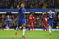 PRESTASI CEMERLANG: Willian meraikan golnya dalam kemenangan 2-0 ke atas Liverpool dalam Piala FA di Stamford Bridge kelmarin.- Foto AFP