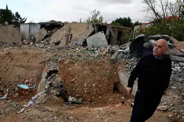 Seorang pegawai tempatan Baalbek, Encik Fayez al Takesh, berdiri di tapak rumah yang rosak di Baalbek di Lebanon selepas gencatan senjata antara Israel dengan Hezbollah, Lebanon, pada 28 November.