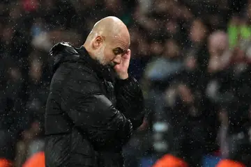 Reaksi ketua jurulatih Manchester City, Pep Guardiola ketika pasukannya tewas 2-4 di perlawanan bola sepak Liga Juara-Juara UEFA melawan Paris Saint Germain (PSG) di Paris pada 22 Januari.