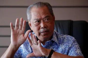 TAN SRI MUHYIDDIN YASSIN: Akan memfailkan permohonan  membatalkan tiga pertuduhan pengubahan wang haram membabitkan RM200 juta.