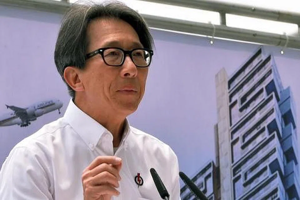 ENCIK LIM SWEE SAY: Beliau berkata pemerintah akan mendekati syarikat yang lemah dari segi teras pekerja setempat serta kurang memupuk bakat warga Singapura. - Foto KHALID BABA