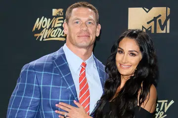 FILEM BARU LEBIH HEBAT: John Cena, yang ditemani temanitanya Nikki Bella, berpendapat filem The Wall, yang terbaru lakonannya, lebih hebat berbanding filem-filem lakonannya sebelum ini. - Foto AFP