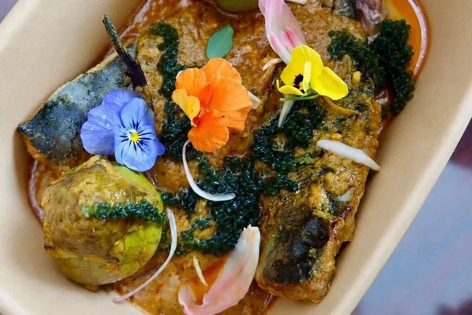 Nasi Ulam Asam Pedas Ikan Cencaru, $19.50.